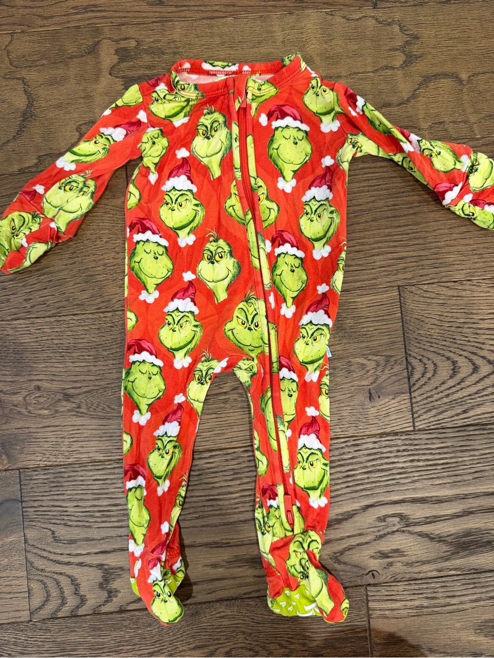 Posh Peanut Red Grinch Print Footed Kids Pajamas